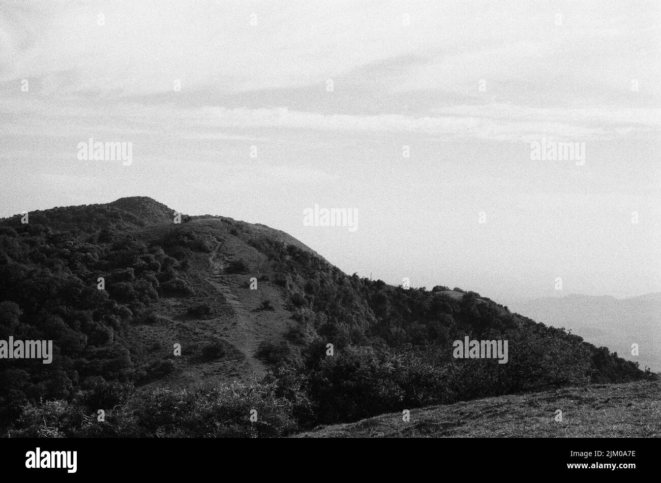 A grayscale shot of Ngong Hills near Nairobi, Kenya Stock Photo