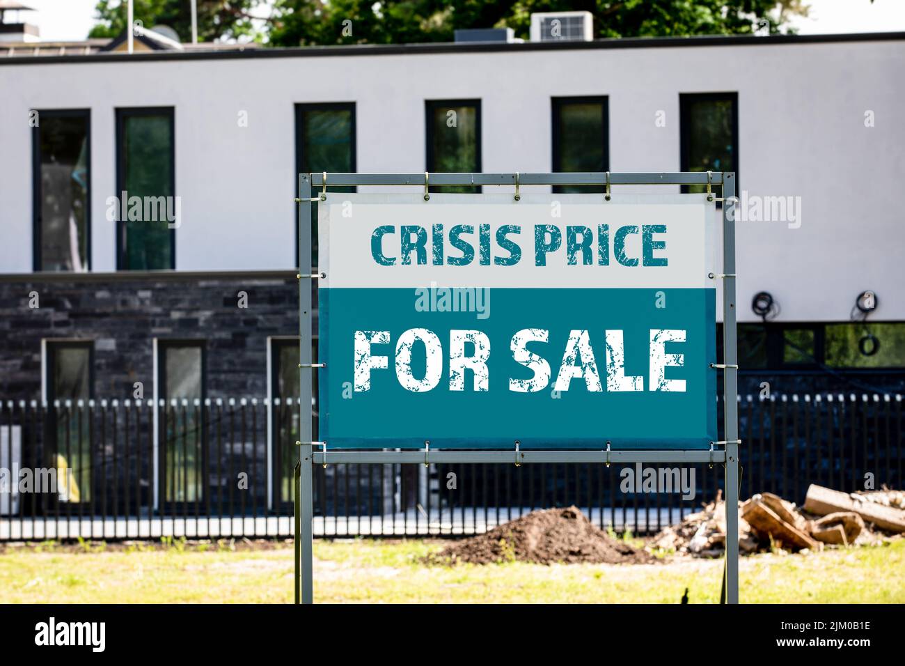 Home For Sale Real Estate Sign. Economic crisis and investment. Stock Photo