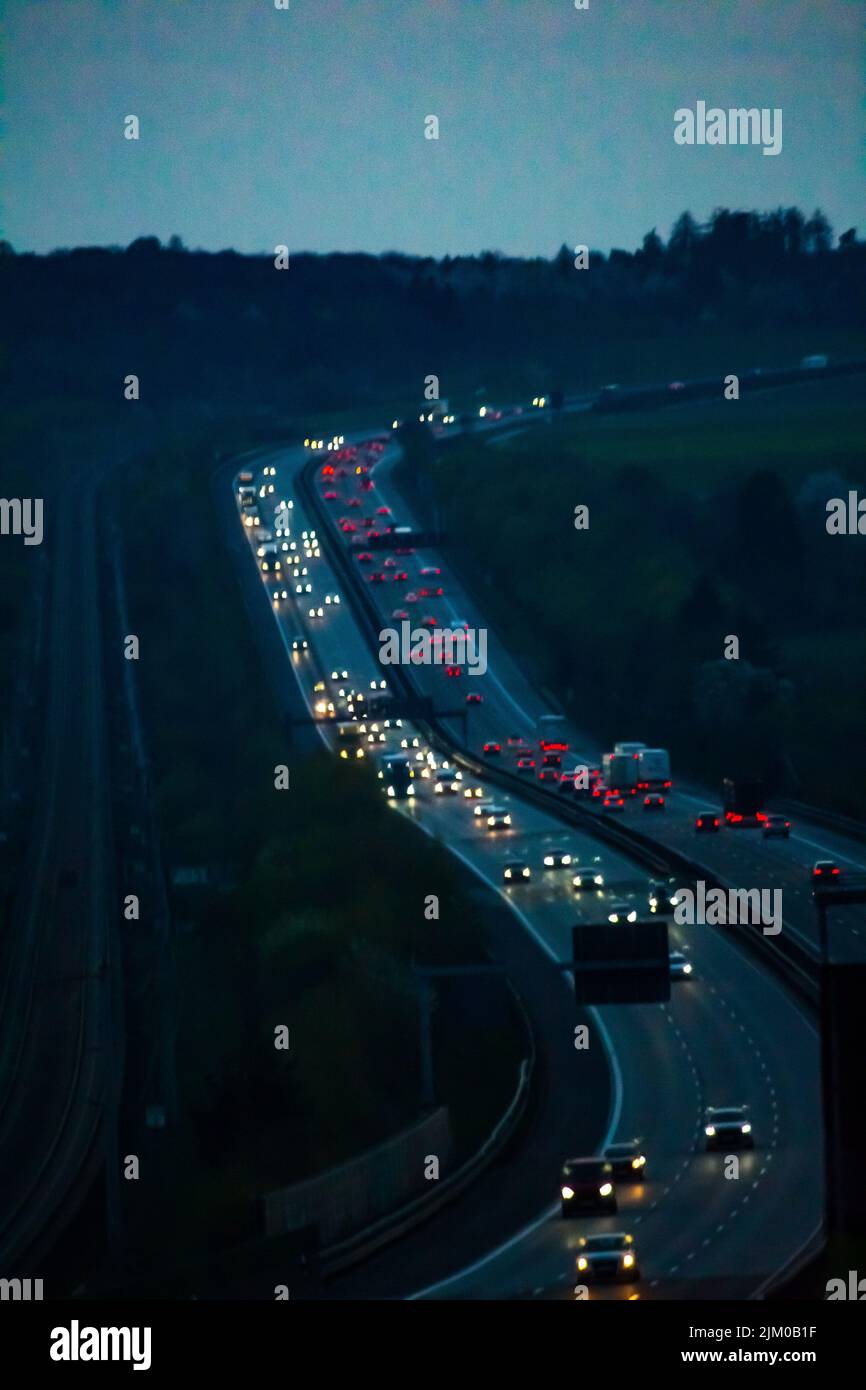 The vertical shot of cars circulating with traffic in a highway in the ...