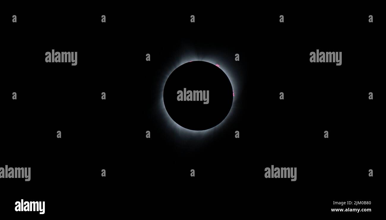 A view of the solar eclipse in a dark sky over Madras, Oregon Stock Photo