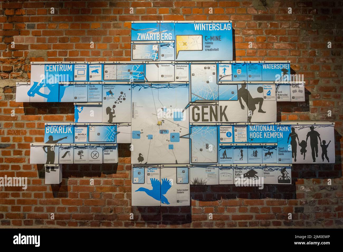 Genk, Belgium, April 2022: tear paper folder overview of touristic highlights in Genk, Belgium Stock Photo