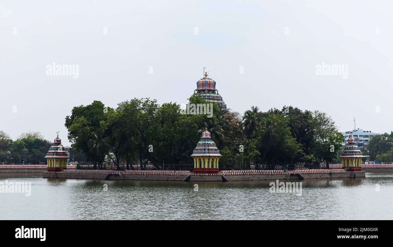 View of Mariamman Kovil Teppakulam Temple, Madurai, Tamilnadu, India.  A temple pond complex with a man-made island in the middle Stock Photo
