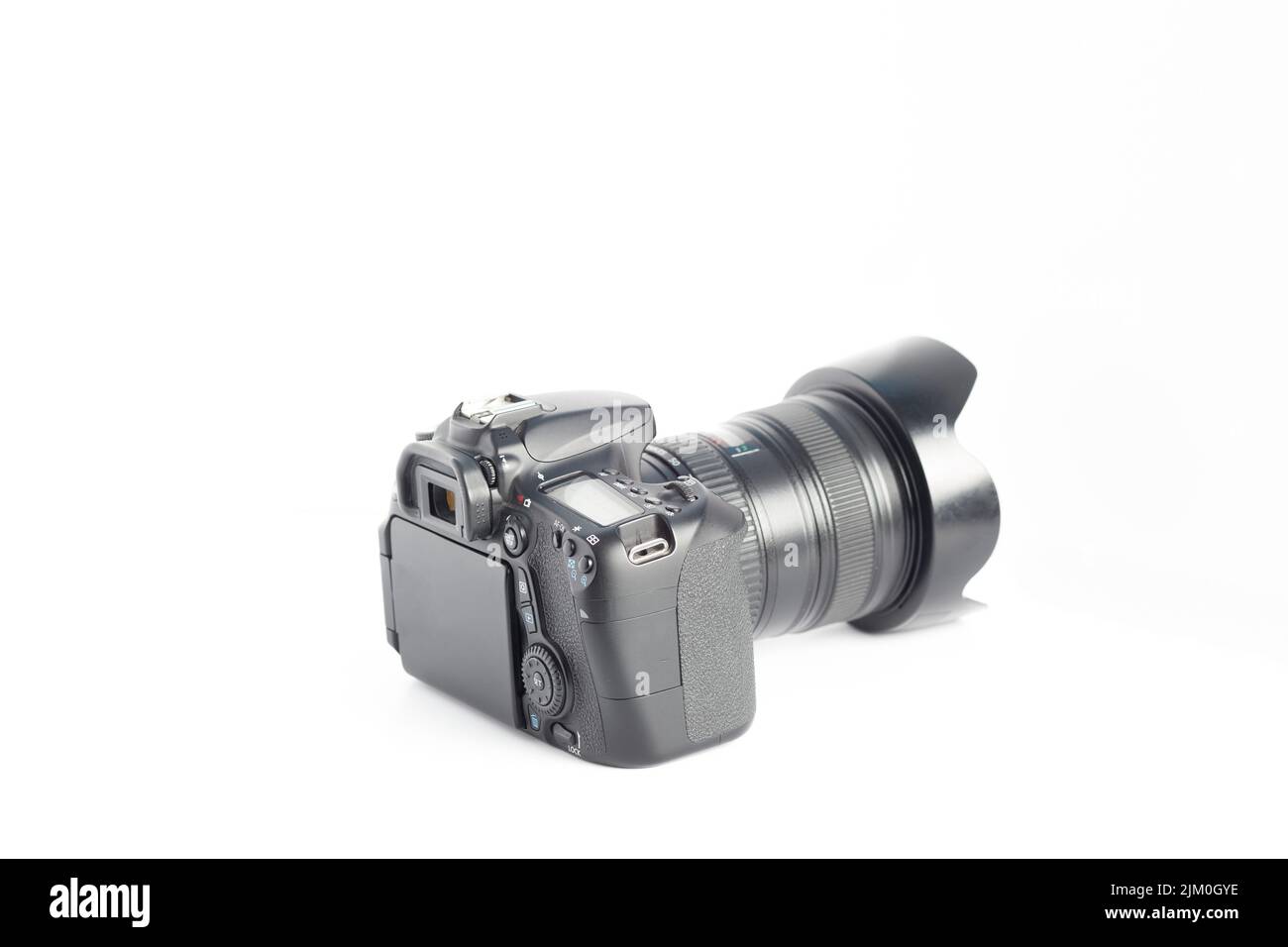 A closeup of a camera on a white surface Stock Photo