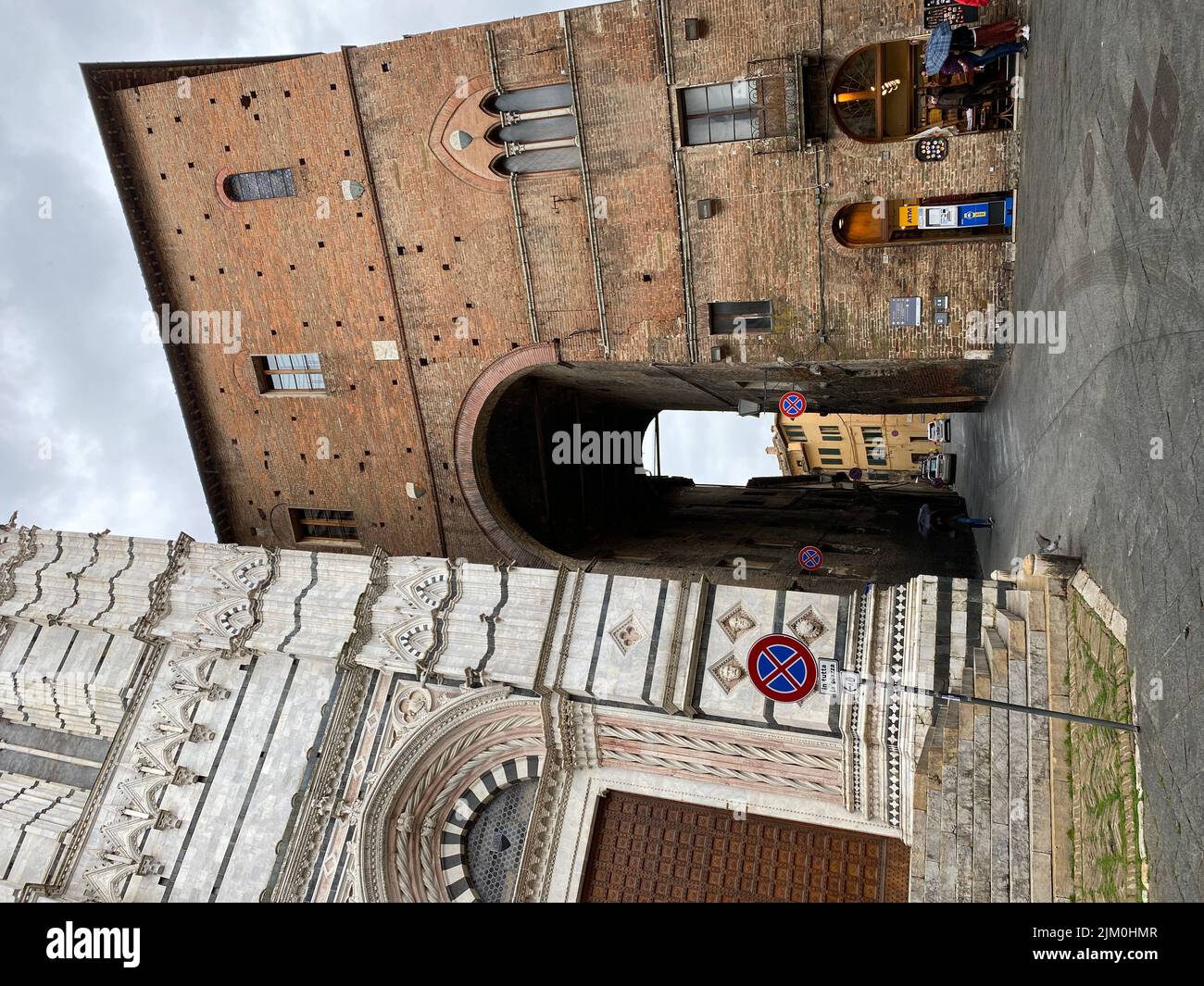 A street of the historic center in the Tuscan town of Siena, Italy Stock Photo