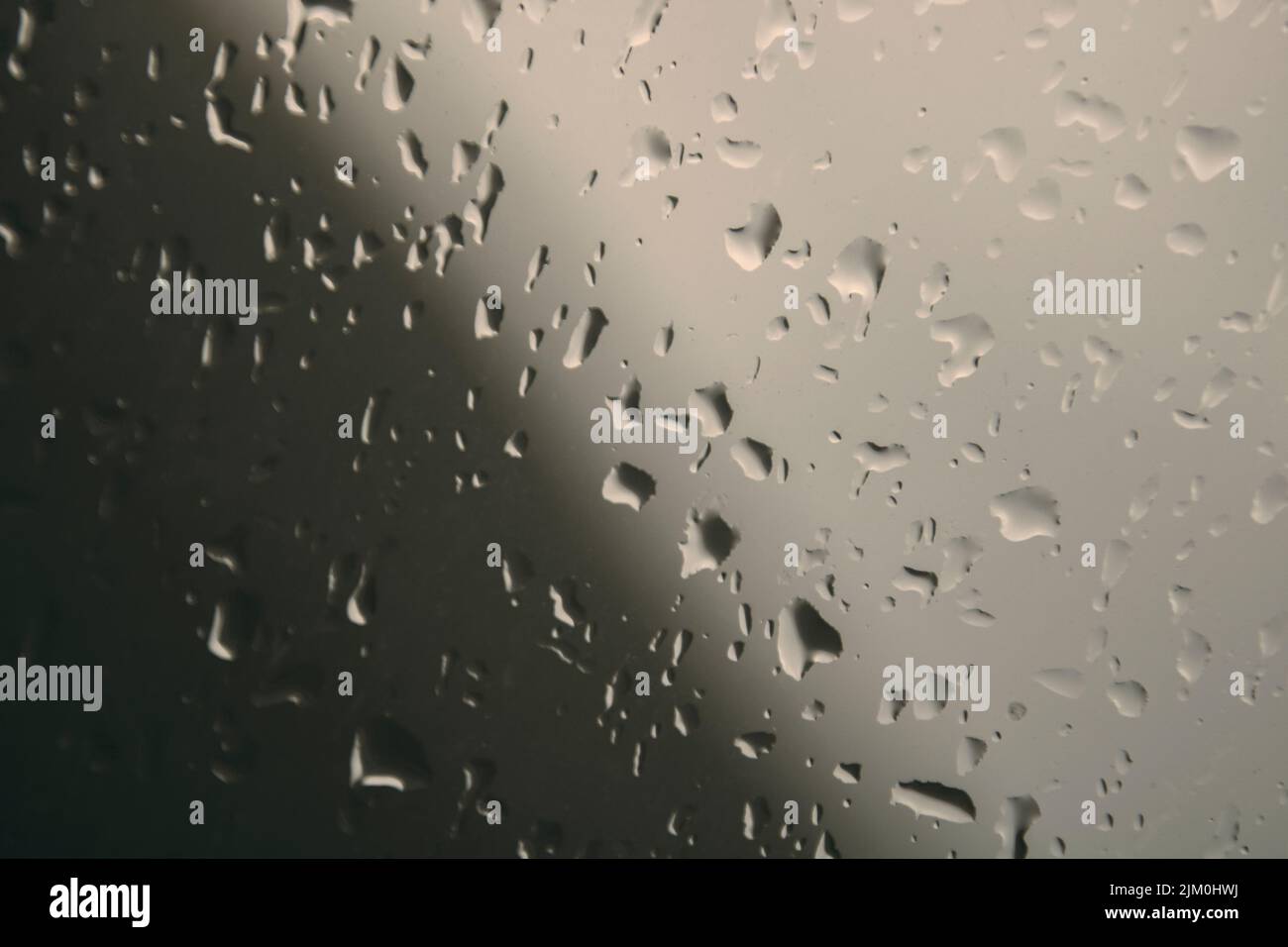 Water drops on a glass window Stock Photo