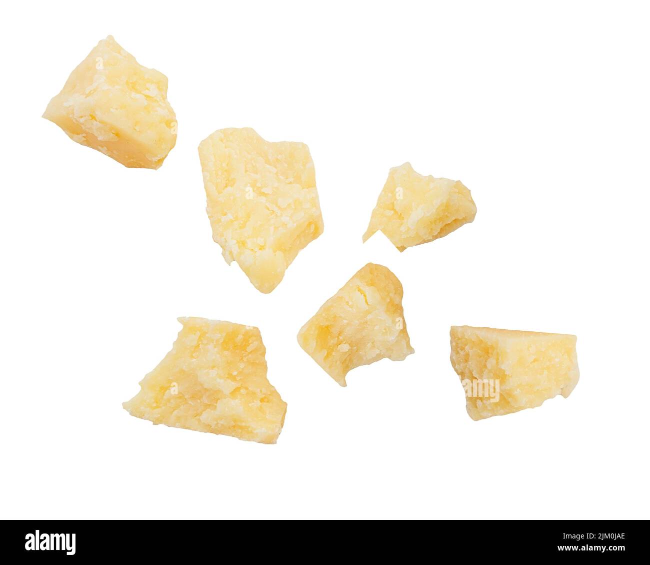 Pieces of fresh natural parmesan cheese isolated on white, clipping path Stock Photo