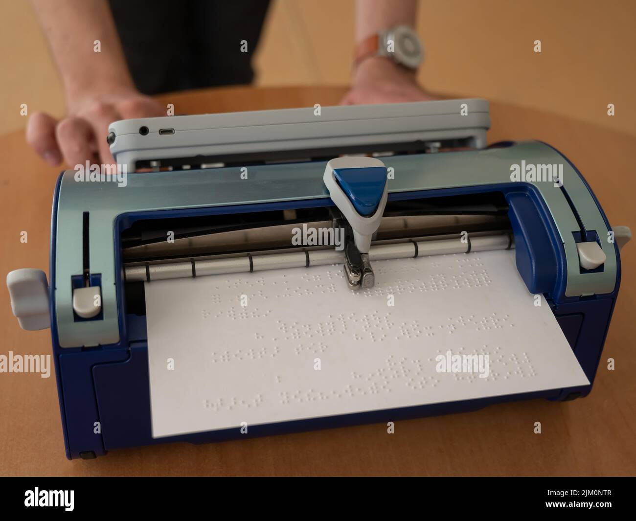 Blind man using braille typewriter Stock Photo Alamy