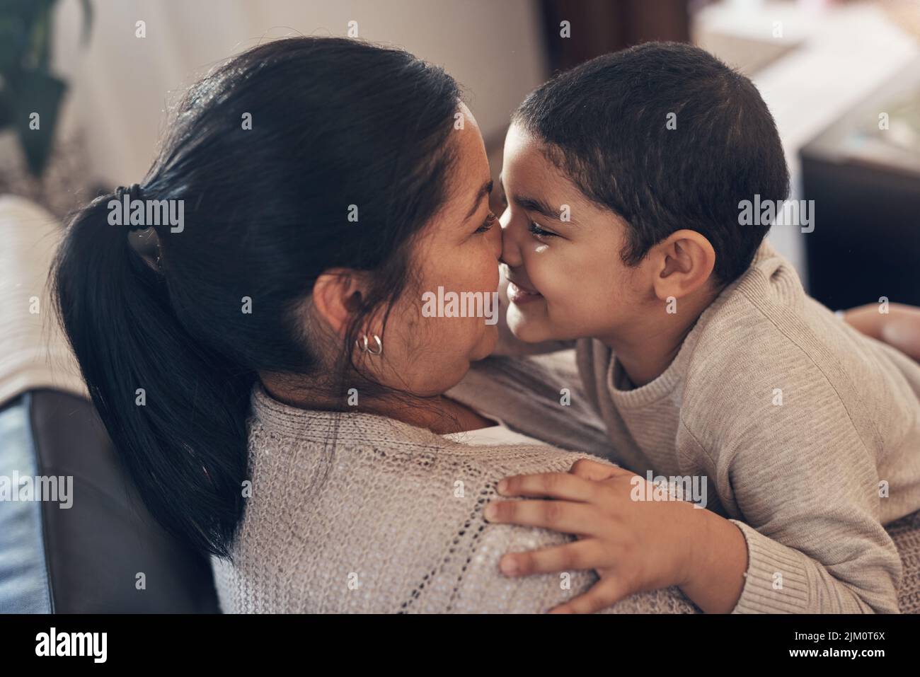 Little boy kissing mom natural hi-res stock photography and images - Alamy