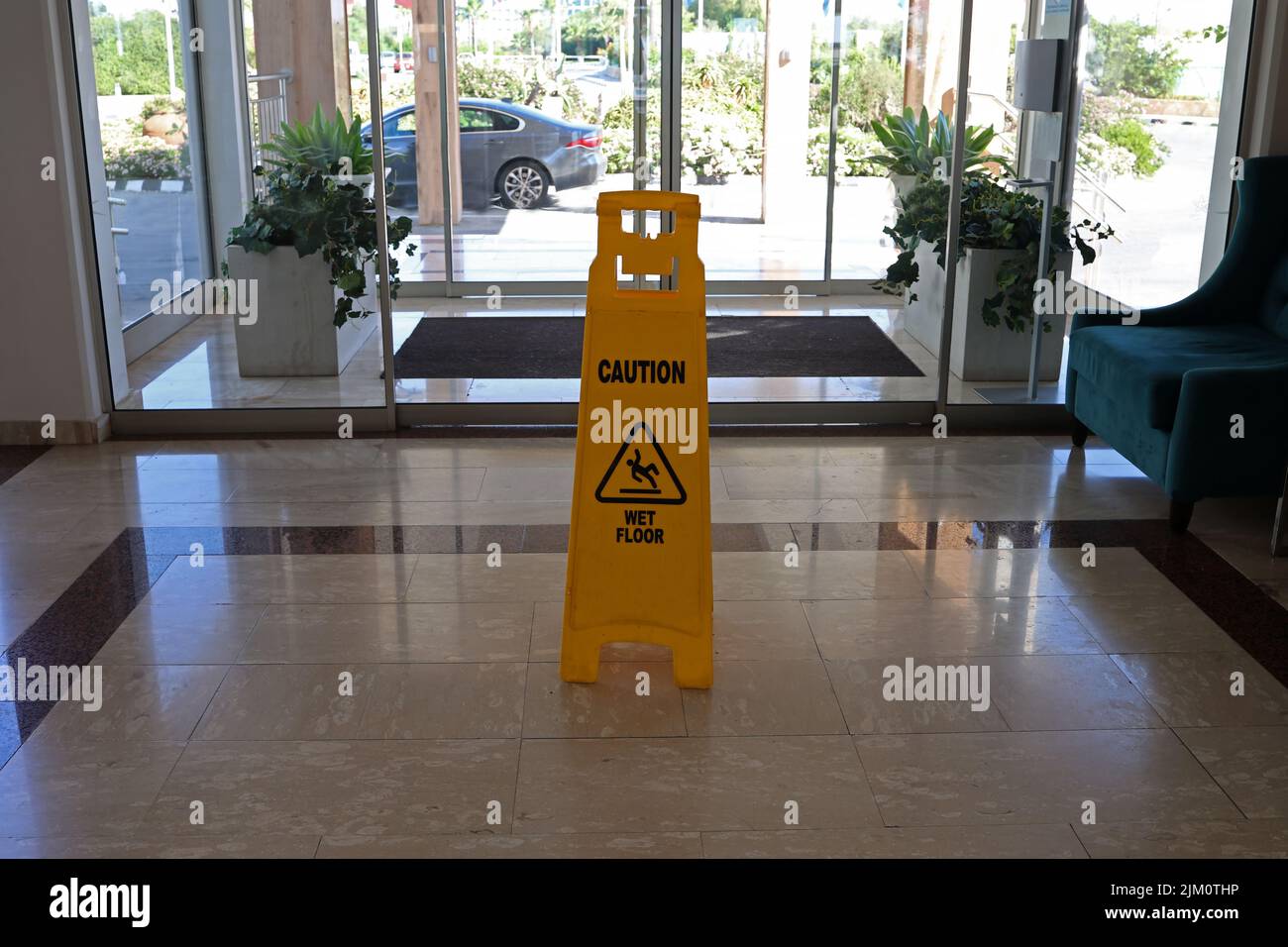 Danger of slipping on a wet floor while cleaning Stock Photo Alamy
