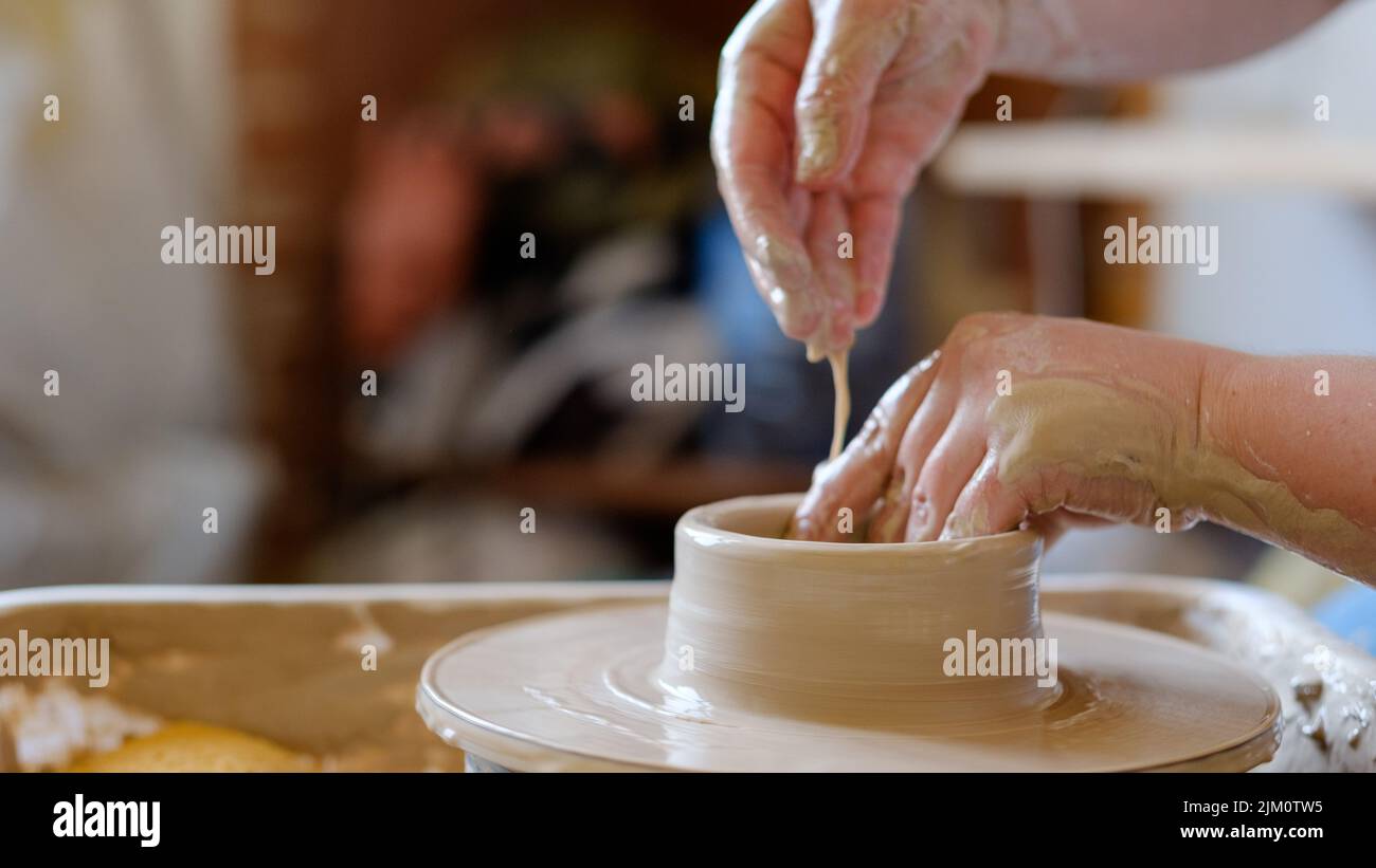 pottery workshop handmade craft artisan clay wheel Stock Photo