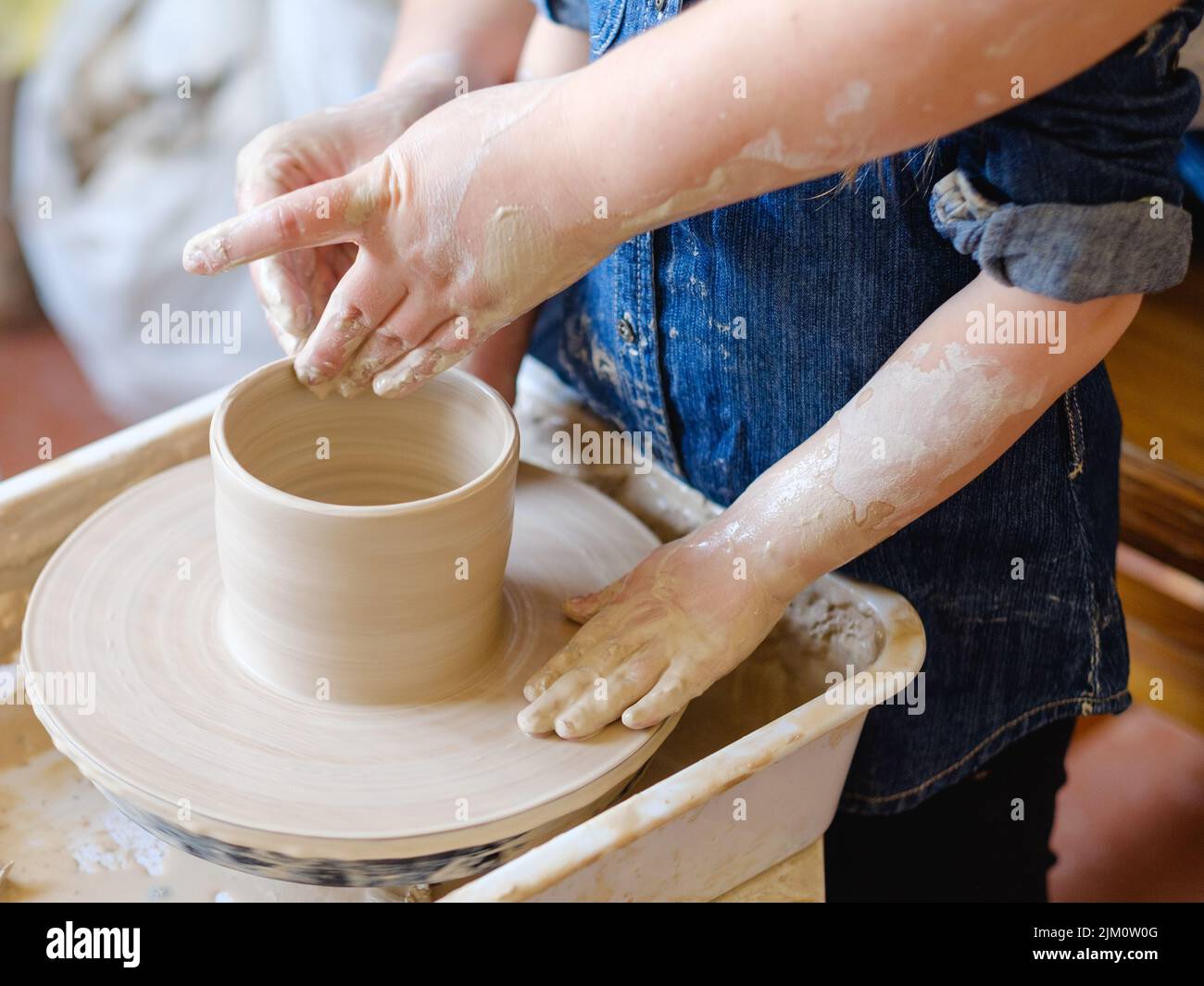 pottery craft artisan teach child clay Stock Photo Alamy