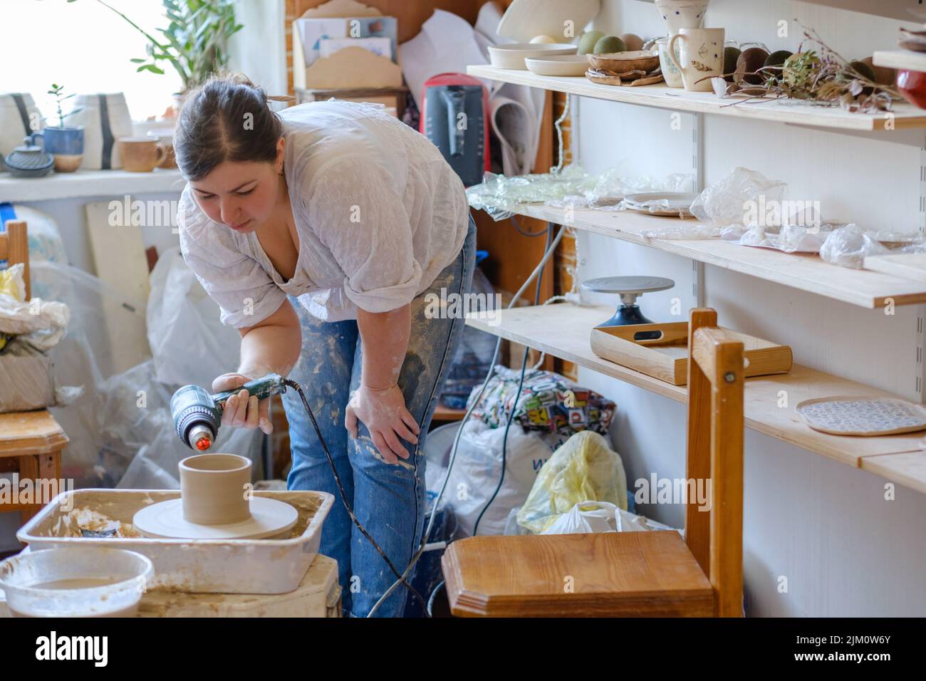 pottery workshop interior clay dishes collection Stock Photo - Alamy