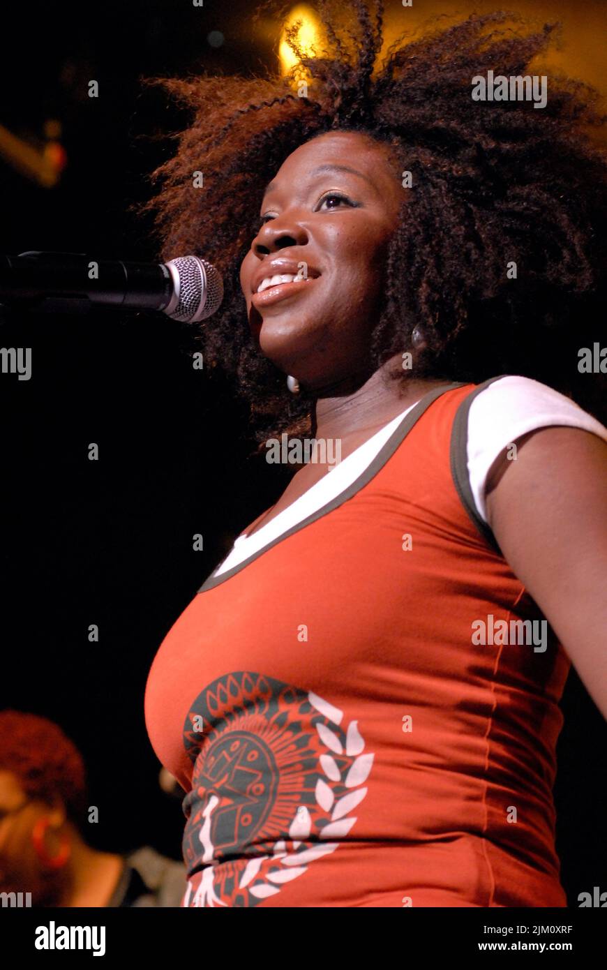 A closeup of India Arie performing live at the Grove of Anaheim, in Anaheim, California Stock Photo