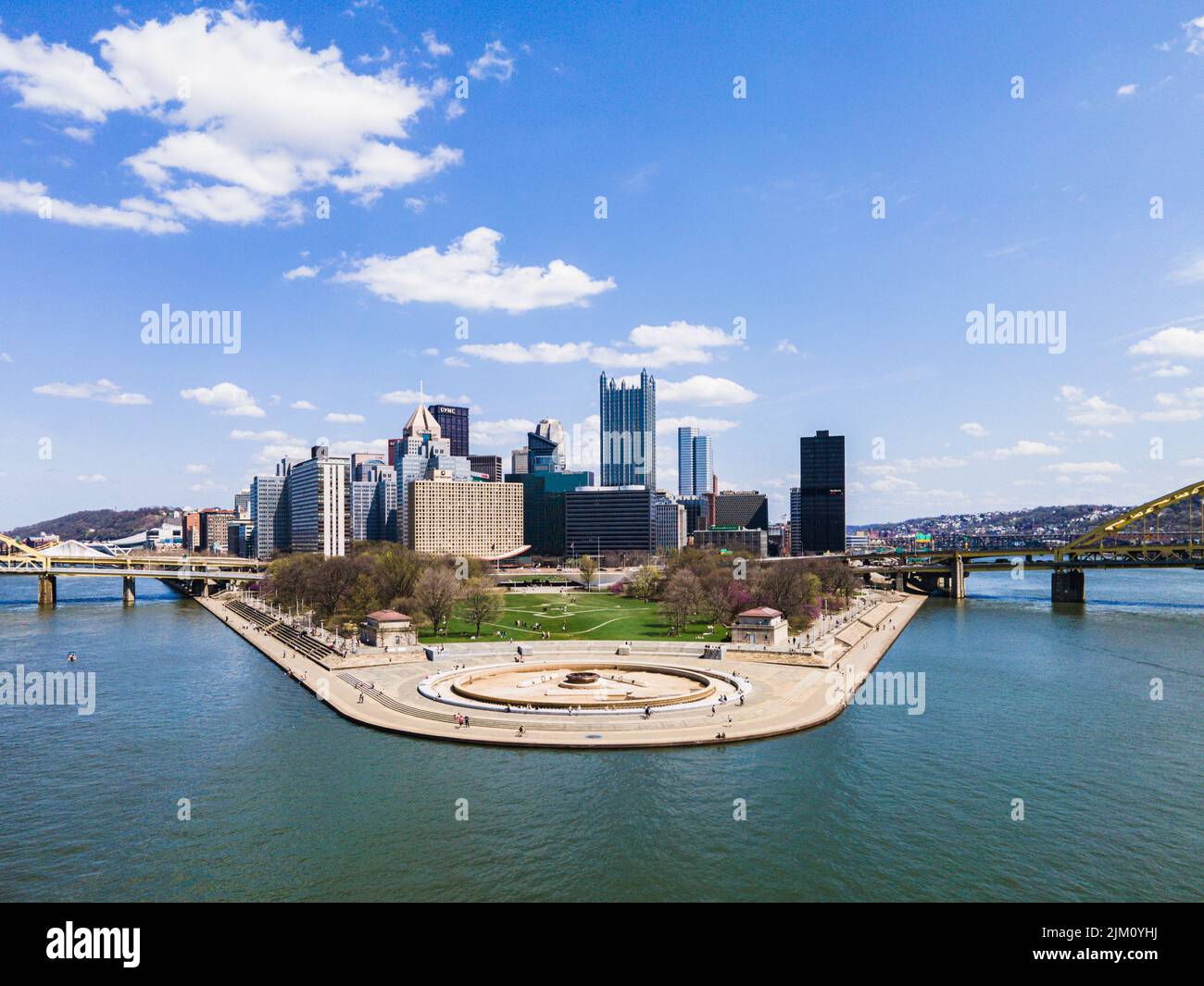 An aerial shot of Point State Park with some skyscrapers and blue sky in Pittsburgh, United States Stock Photo