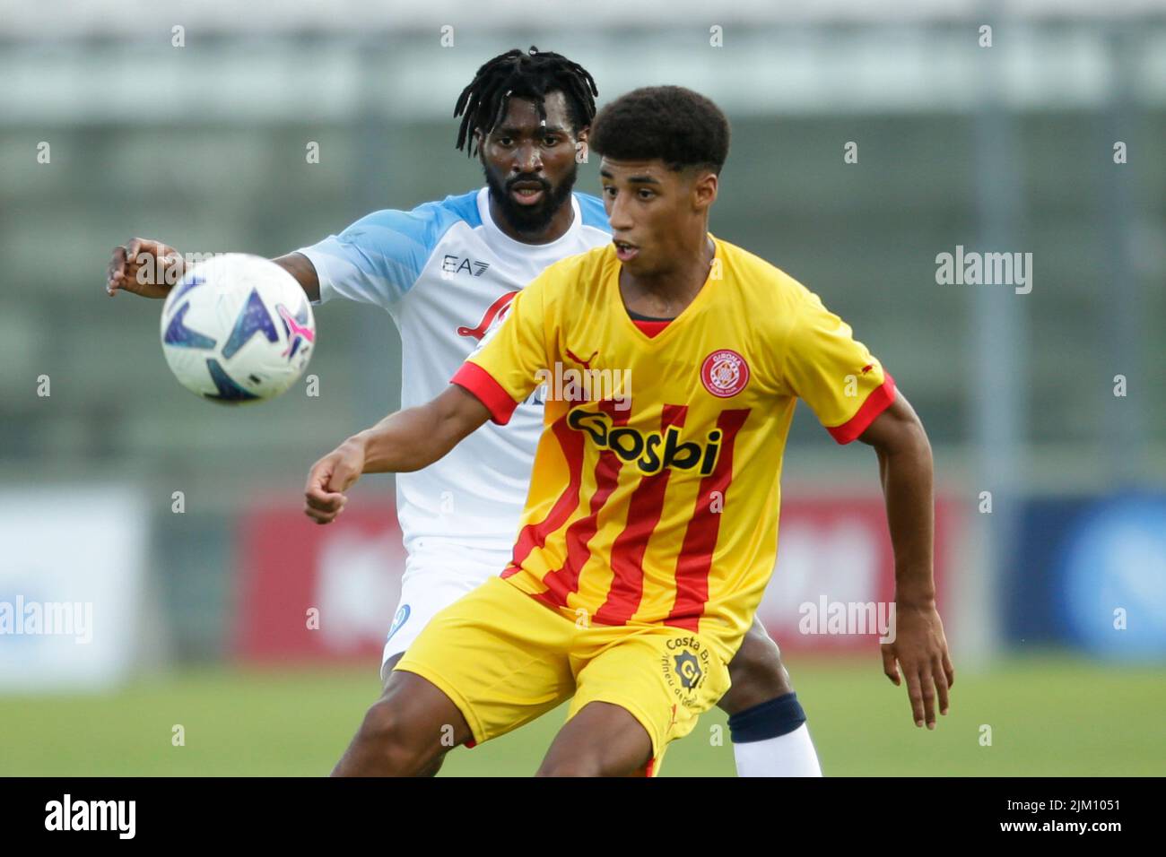 SSC Napoli's Cameroonian striker Andre Zambo Anguissa challenges for the ball with Girona's forward Oscar Urena during friendly match SSC Napoli Girona at the SSC Napoli's 2022-23 pre-season training camp in Castel di Sangro Stock Photo