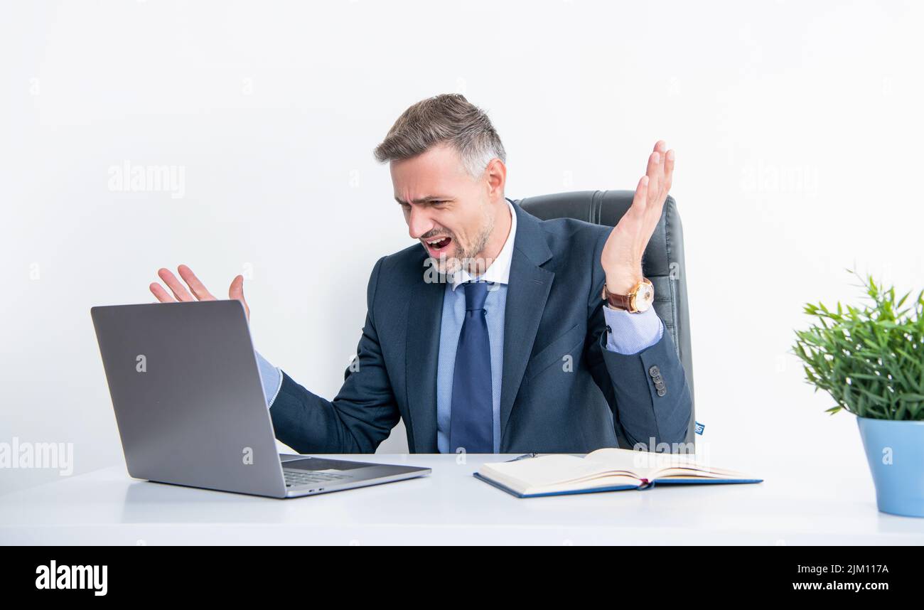 mature stressed boss shouting in business office Stock Photo