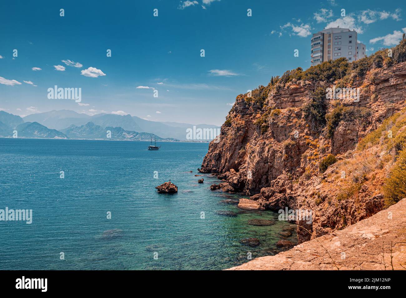 Lara district of a resort town of Antalya, Turkey situated on a high cliff. Vacation and coastline concept Stock Photo