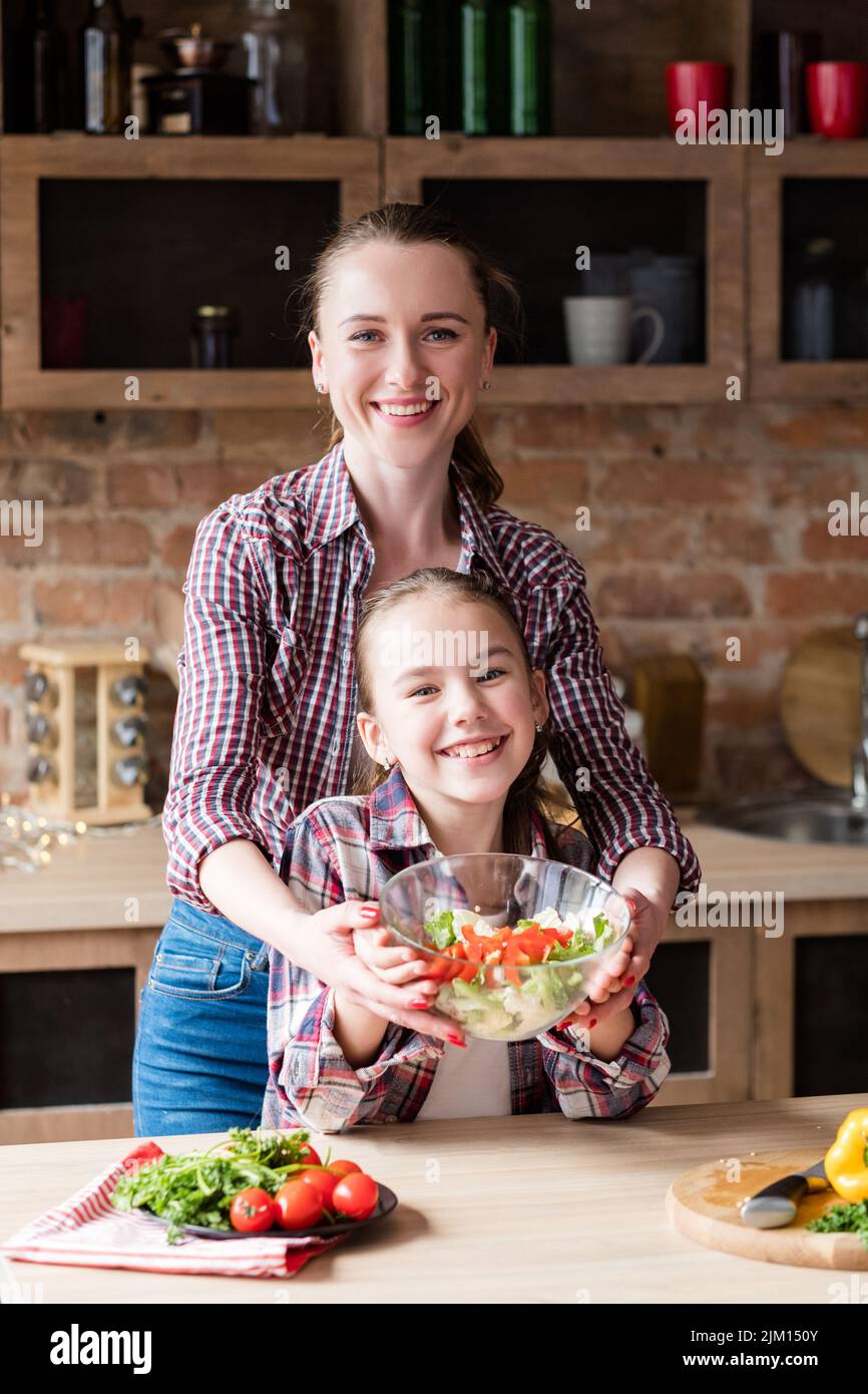 healthy family eating lifestyle preparing salad Stock Photo