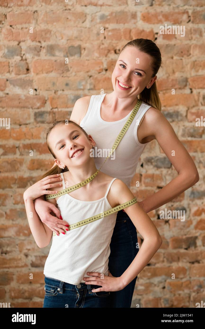 healthy fit family lifestyle daughter watch figure Stock Photo