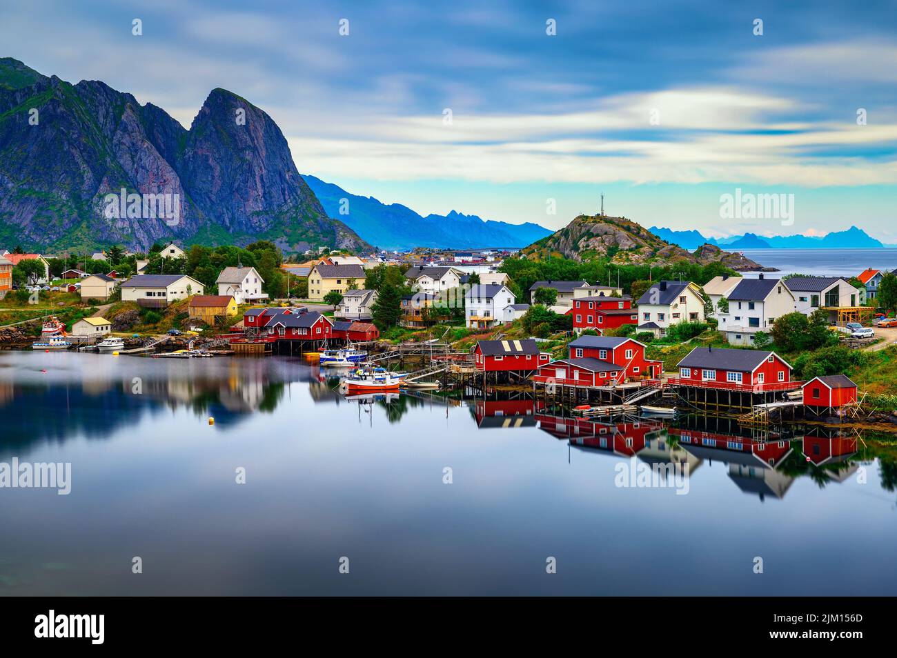 Reine village with red rorbu cottages and mountains on Lofoten islands, Norway Stock Photo