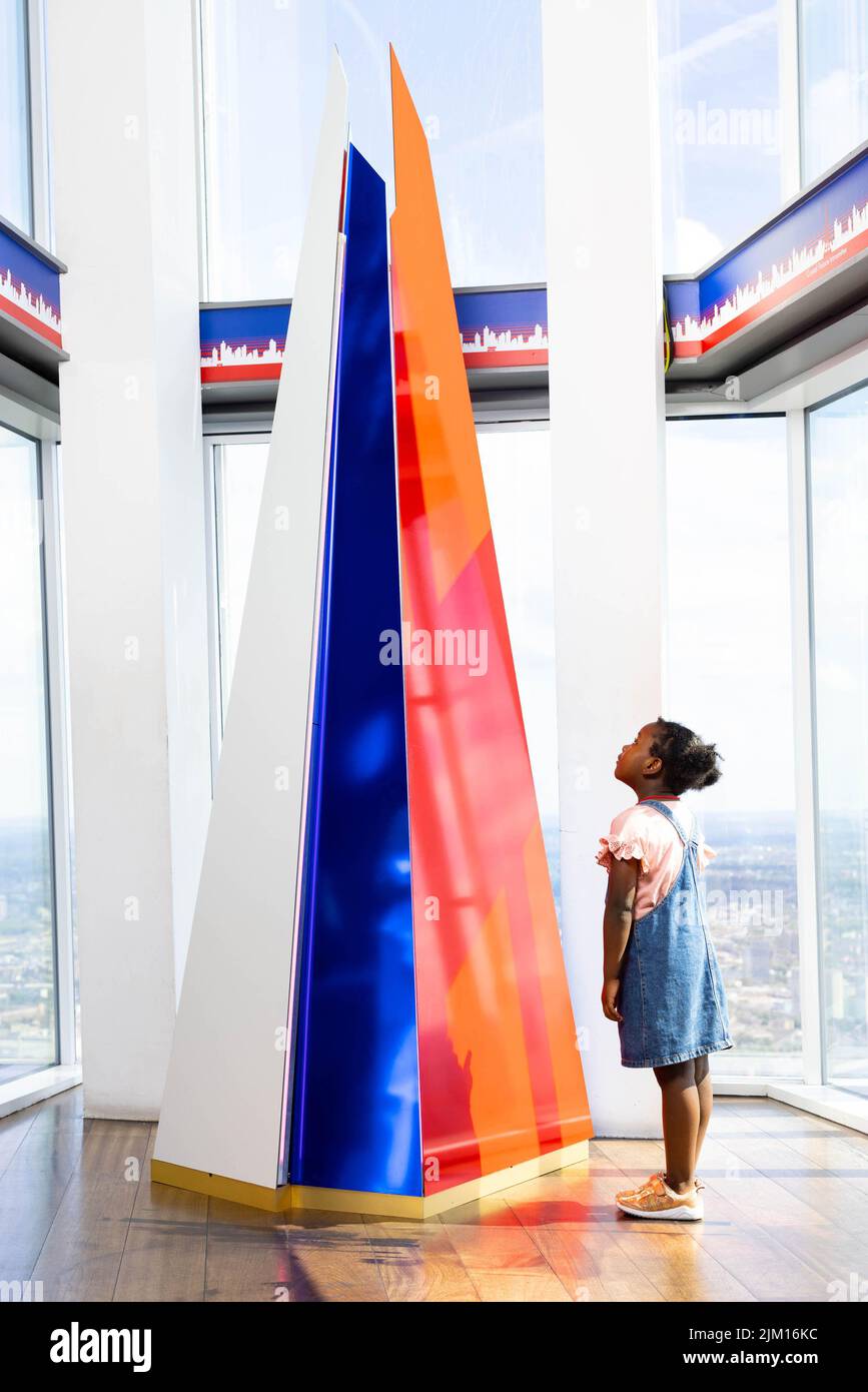EDITORIAL USE ONLY Elise Ojukwu, age 5, at 'The View from The Shard' as the tourist attraction unveils its new themed visitor experience, 'British Icons'. Issue date: Thursday August 4, 2022. Stock Photo