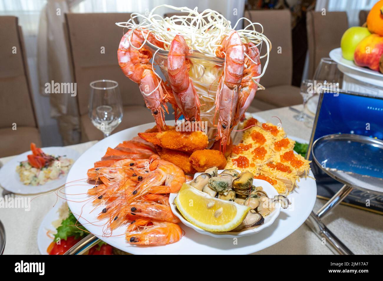 A table served with seafood in a restaurant Stock Photo - Alamy