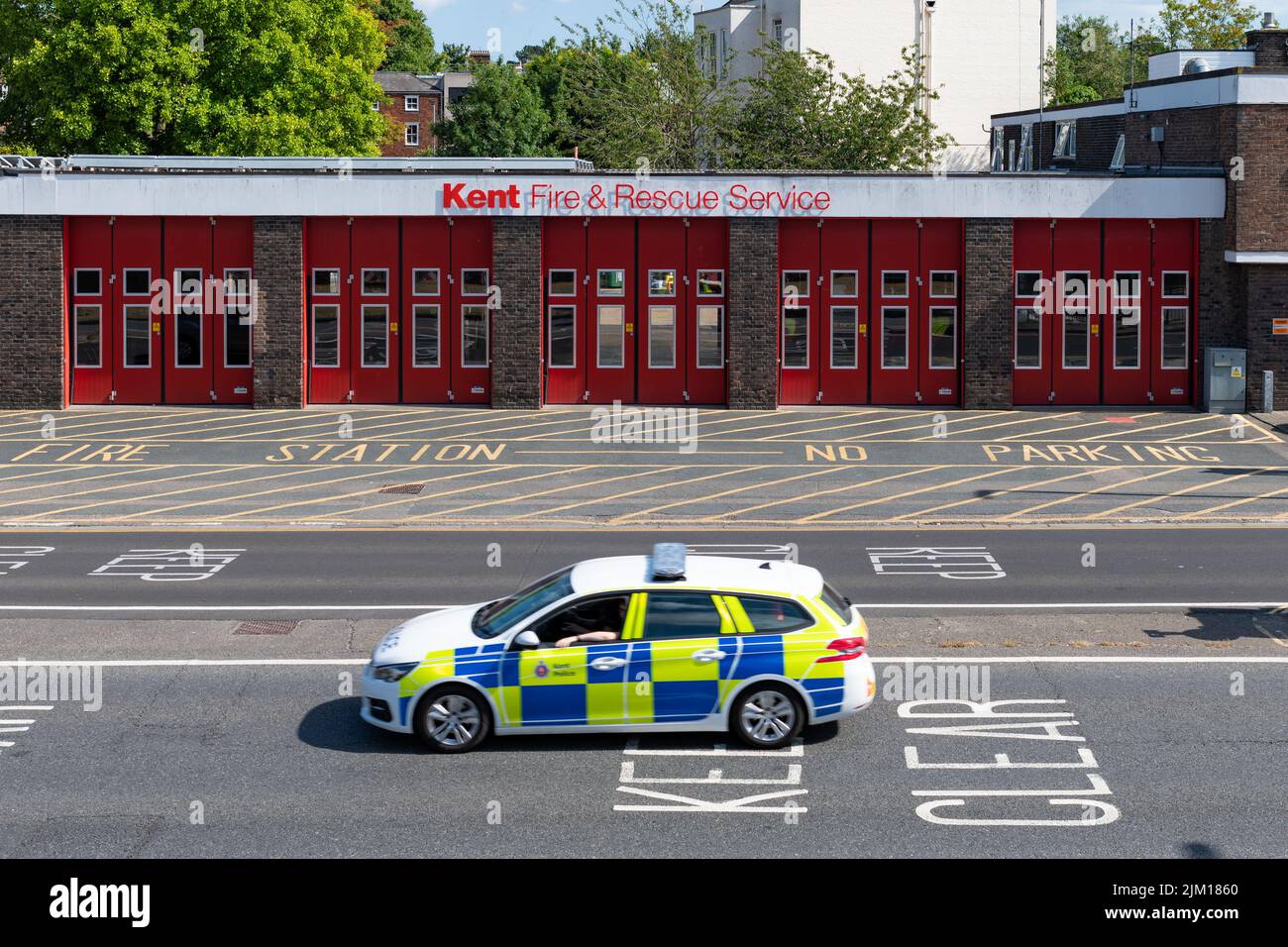 Kent emergency services - Kent Fire and Rescue Service station and Kent Police Car - Canterbury, England, UK Stock Photo