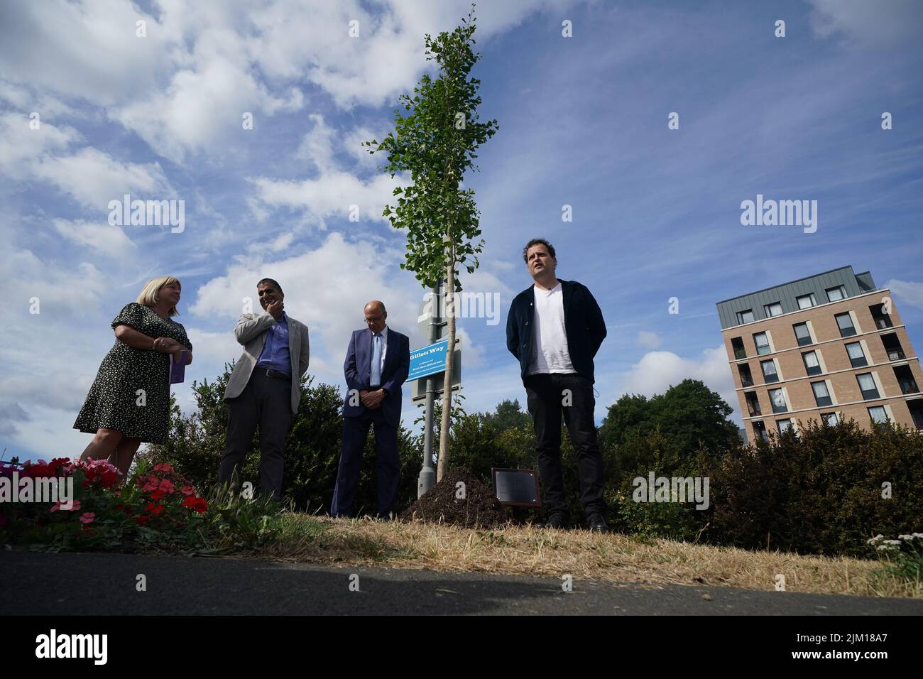 Doctor and best-selling author Adam Kay (right), who wrote BBC hospital drama This Is Going To Hurt, plants a tree at Ealing Hospital, west London, in commemoration of NHS staff who have taken their own lives. Kay's BBC drama features a moving scene where a tree is planted in memory of character Shruti, a doctor who committed suicide. After contact with the real-life hospital's CEO a memorial tree will now stand permanently on the hospitals grounds. Picture date: Thursday August 4, 2022. Stock Photo