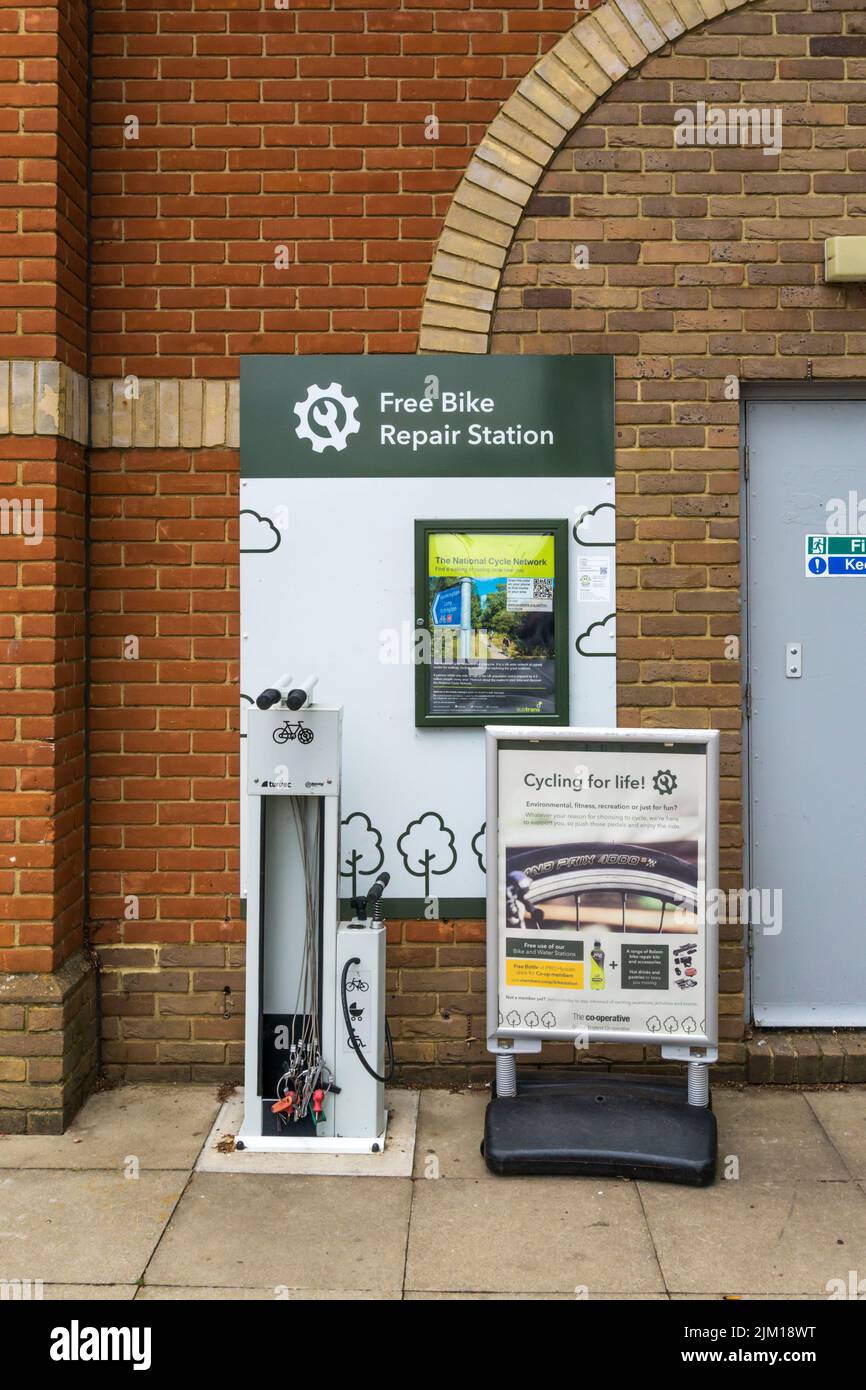 A free bike repair station in the car park outside a Co-Op supermarket Stock Photo