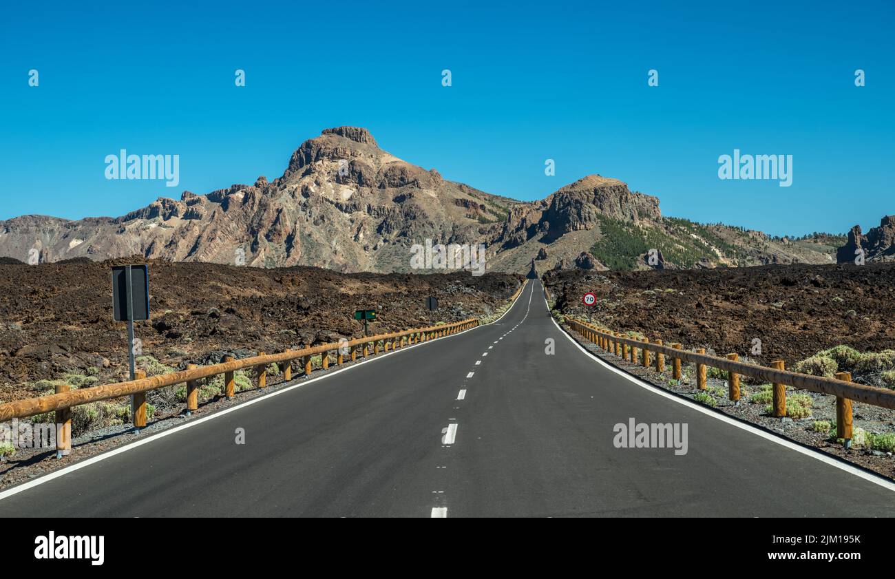 Empty asphalt road in Teide National Park. Tenerife Island. Stock Photo