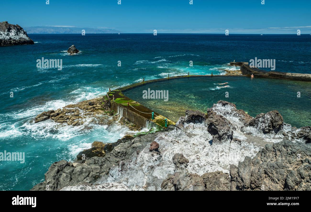 Rocky coastline with natural swimming pool of Tenerife Island. Stock Photo