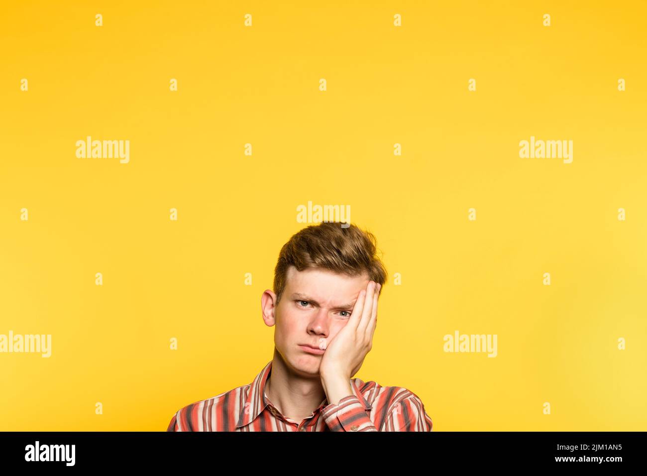 bored weariful indifferent unenthusiastic man Stock Photo