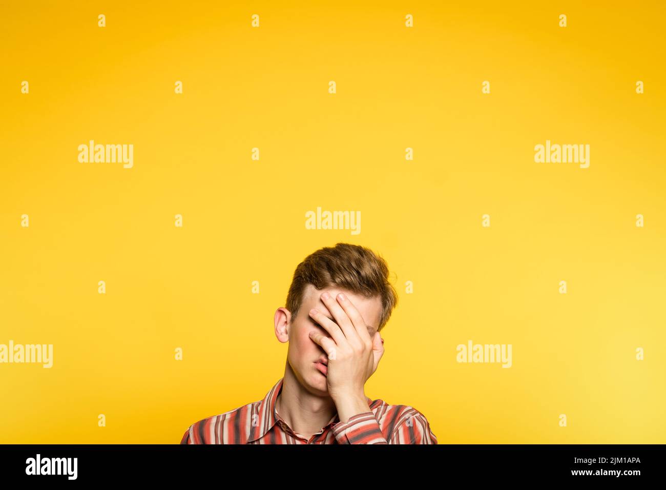 facepalm ashamed abashed man cover face hand Stock Photo - Alamy