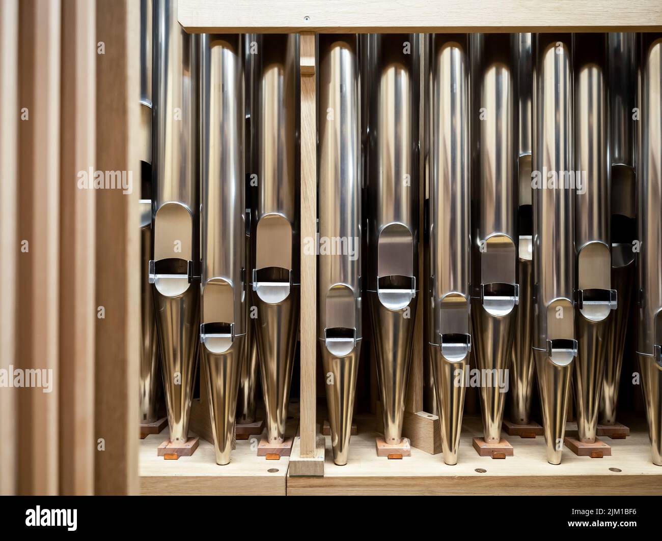 modern steel organ pipes, structure of organ, musical instrument. close