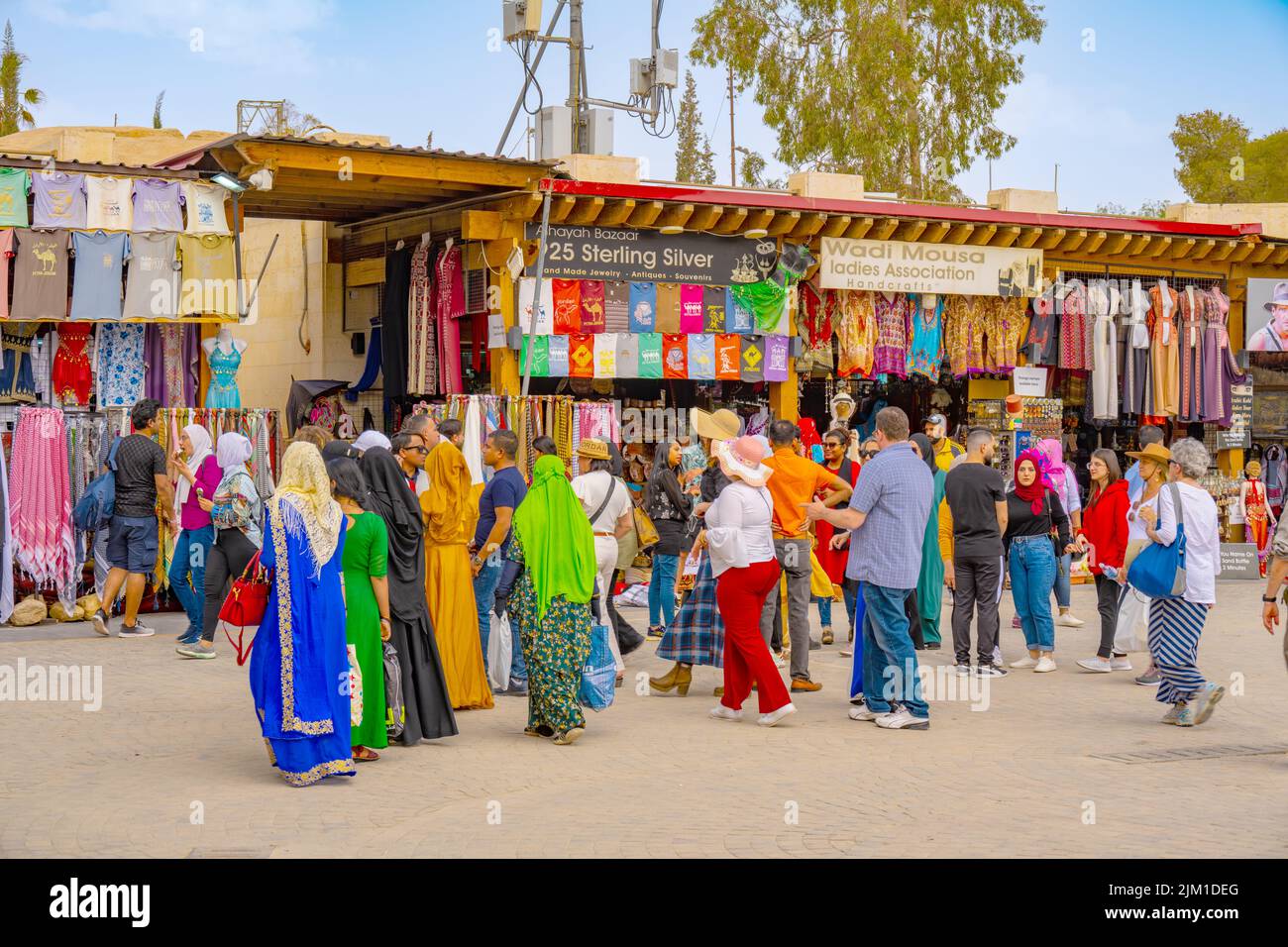 Crowds gathering outside the shops in the entrance area for Petra in Jordan. Stock Photo