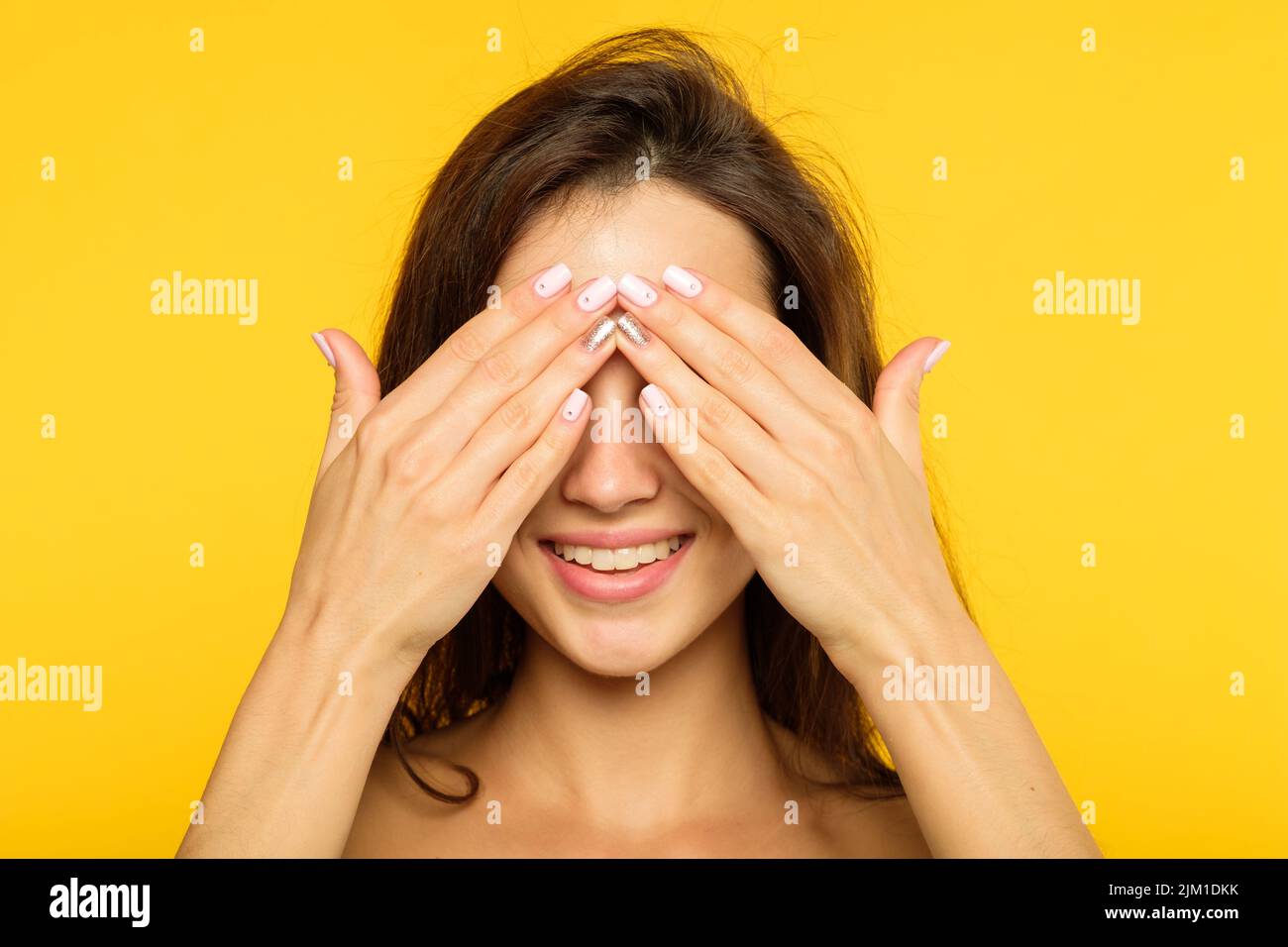 Woman covering eyes hands hires stock photography and images Alamy