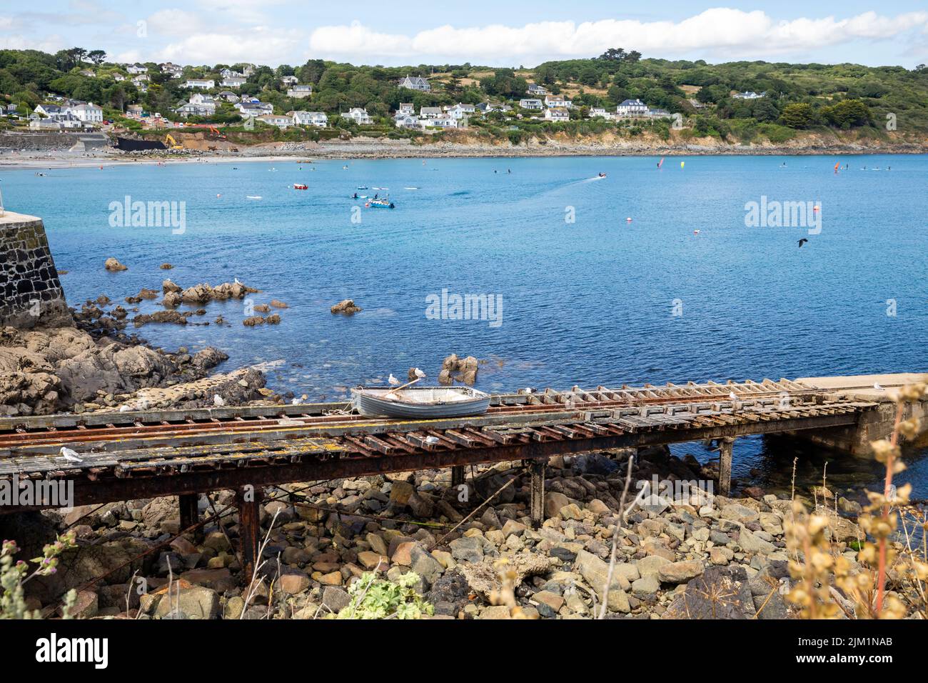 A small dinghy sits on the slipway in Coverack, Cornwall,UK Stock Photo