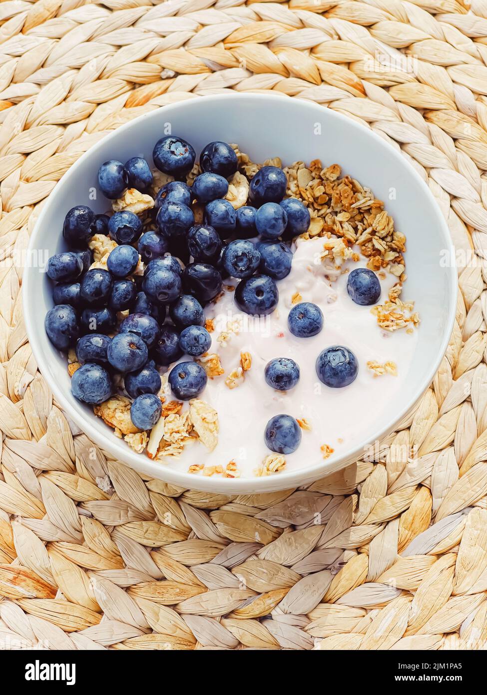 Blueberry yogurt cereal bowl as healthy breakfast and morning meal, sweet food and organic berry fruit, diet and nutrition Stock Photo