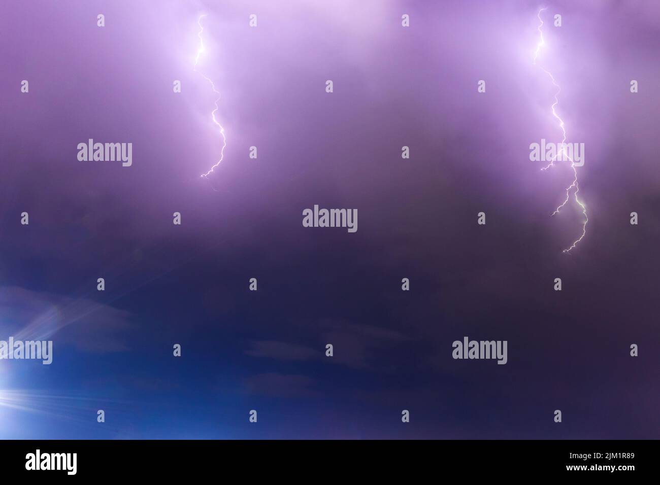 lightning flashes in the night sky Stock Photo Alamy