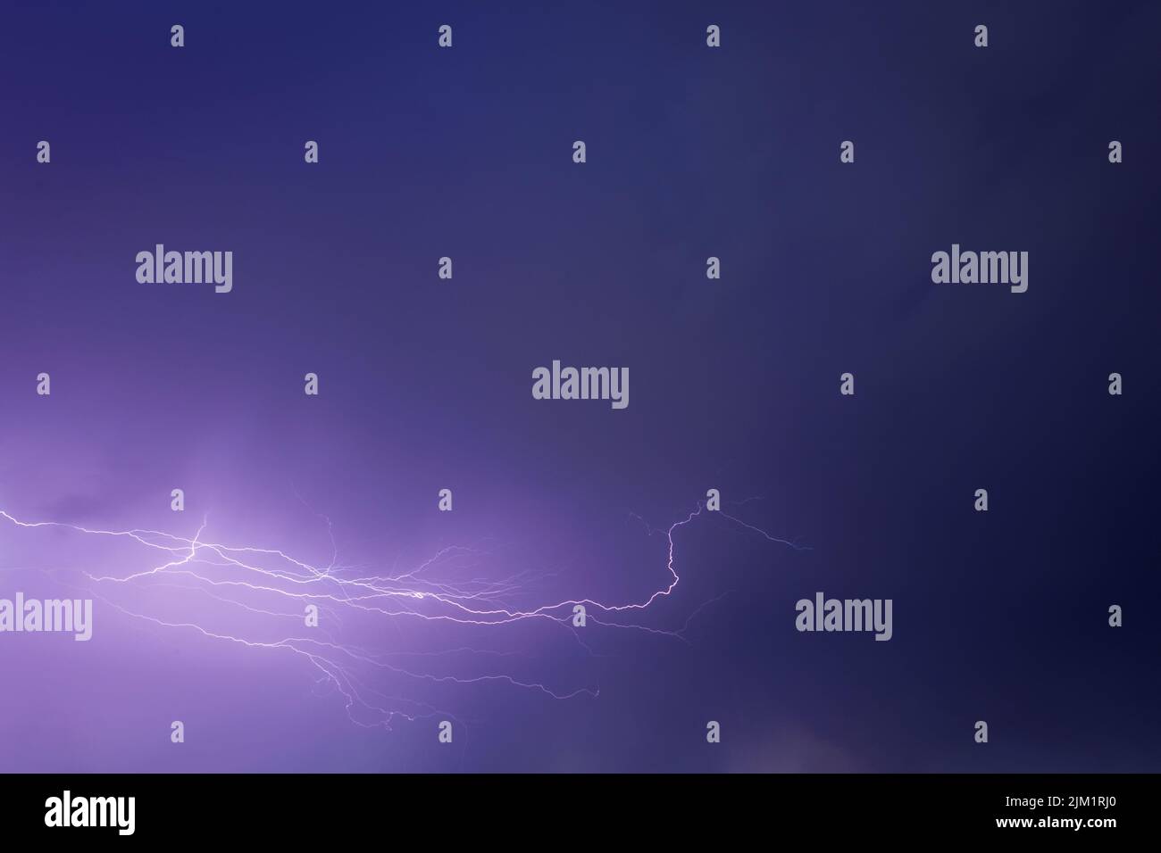 lightning flashes in the night sky Stock Photo Alamy