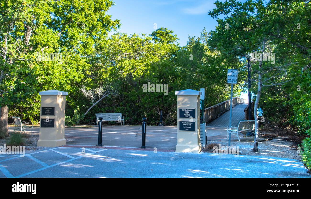 Harborwalk in Punta Gorda Florida runs along the Peace River in Charlotte County and connects five parks. The Harborwalk was made possible because Isa Stock Photo