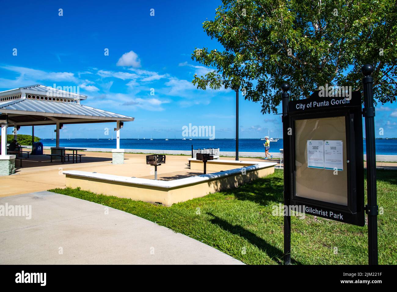 Harborwalk in Punta Gorda Florida runs along the Peace River in Charlotte County and connects five parks. The Harborwalk was made possible because Isa Stock Photo