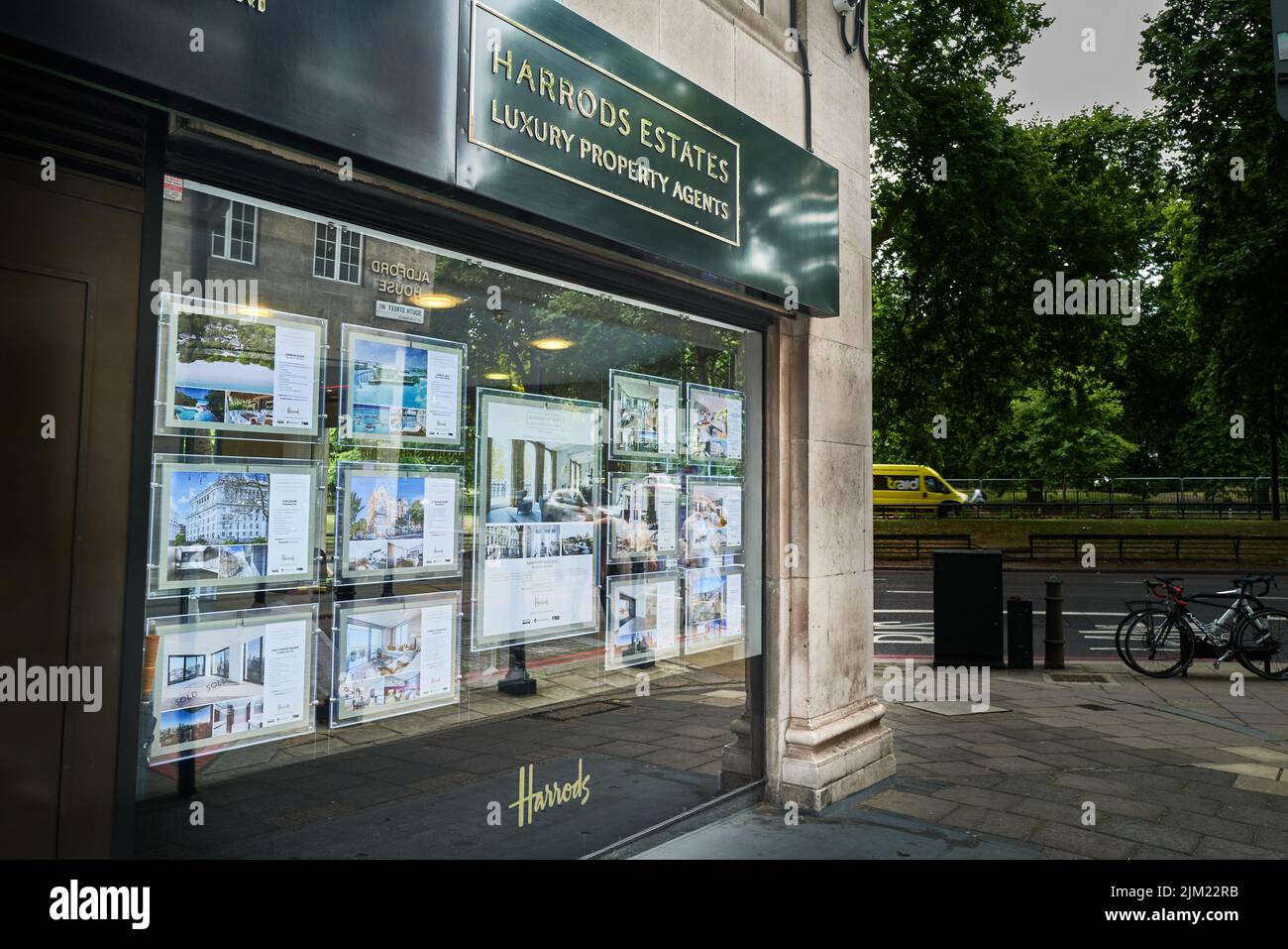 Harrods estates luxury property agents shop, Park Lane, Mayfair, London, England. Stock Photo