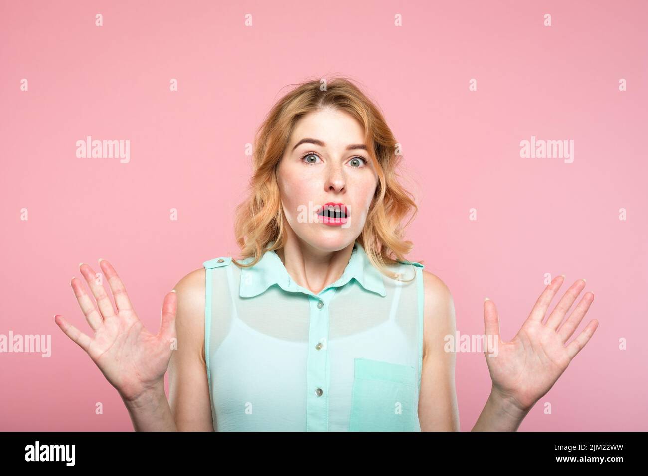 emotion expression overwhelmed shocked woman Stock Photo