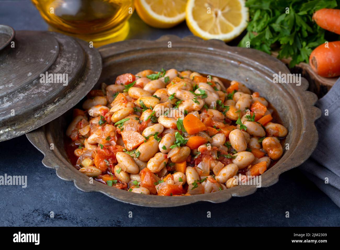 Traditional delicious Turkish food; Kidney beans with olive oil, Red kidney bean stew, Turkish name; Barbunya pilaki Stock Photo
