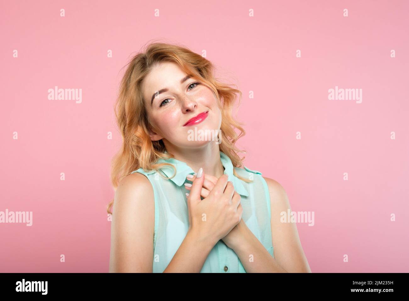 adoration tender emotion girl press hands heart Stock Photo