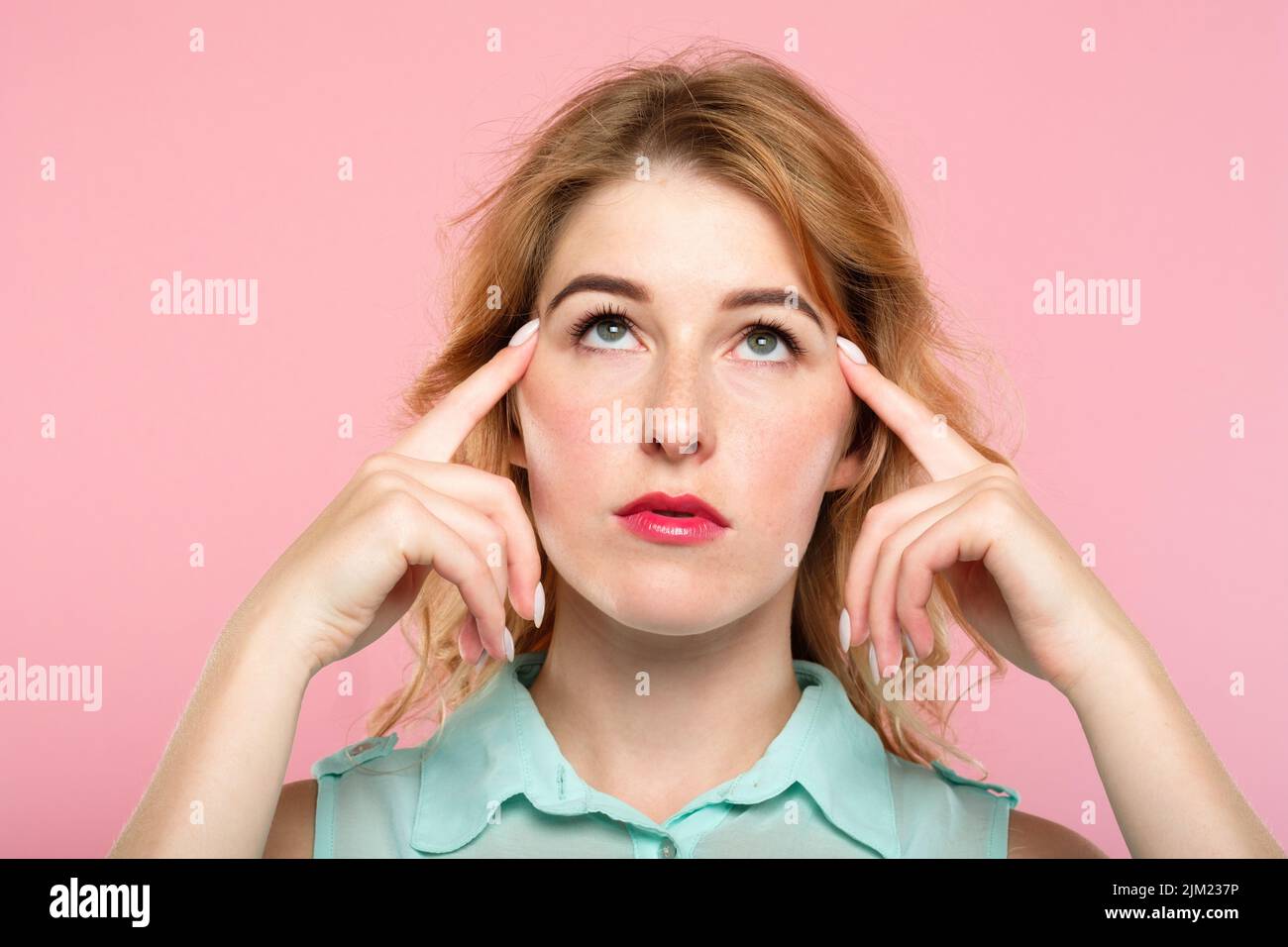 mind games telepathy girl concentrate brain power Stock Photo