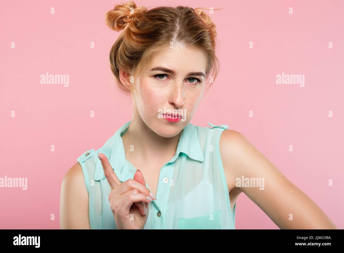 serious strict woman scold nag tell off wag finger Stock Photo