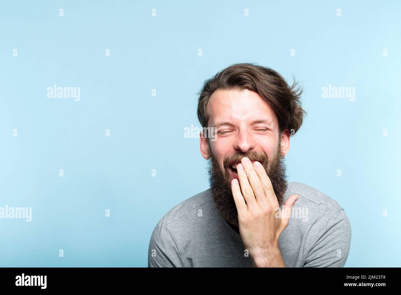 emotion lol joyful exhilarated bearded man laugh Stock Photo