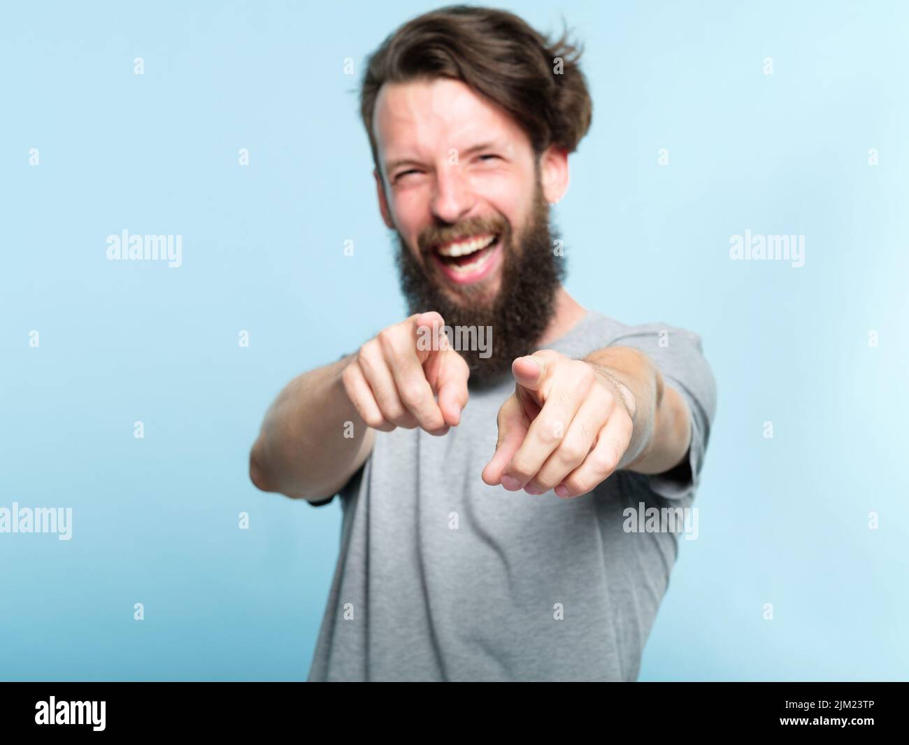 loser man mocking laugh point finger humiliation Stock Photo
